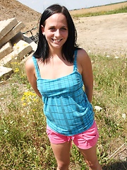 Teenage girl masturbating outside with a sex toy