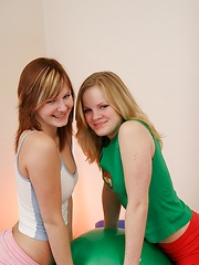 Two girls touching their teenagers private parts