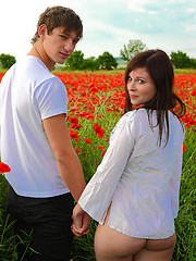 Romantic girl and her boyfriend fucking on the flower field