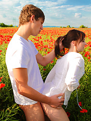 Romantic girl and her boyfriend fucking on the flower field