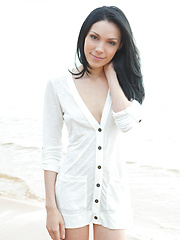 Lily loves outdoor photo shoots, especially on sandy seashores, savoring the cool, balmy wind that makes her breasts erect and stiff, and the cool, frothy water on her skin.