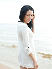 Lily loves outdoor photo shoots, especially on sandy seashores, savoring the cool, balmy wind that makes her breasts erect and stiff, and the cool, frothy water on her skin.