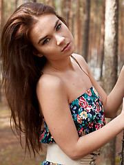 Lachia overwhelming youthful beauty and carefree allure creates a stunning visual treat among the towering pine trees.