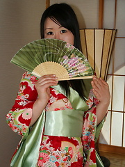 This young Geisha gives a good service to her foreign guest