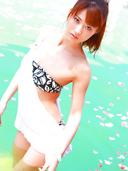 Saki Yamaguchi Asian spoils leering body in water with petals