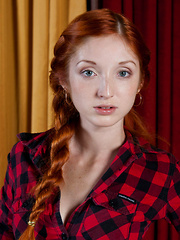 Michelle H lifts her plaid skirt to flaunt her amazing pussy.